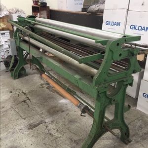 Maquina enrolladora de telas